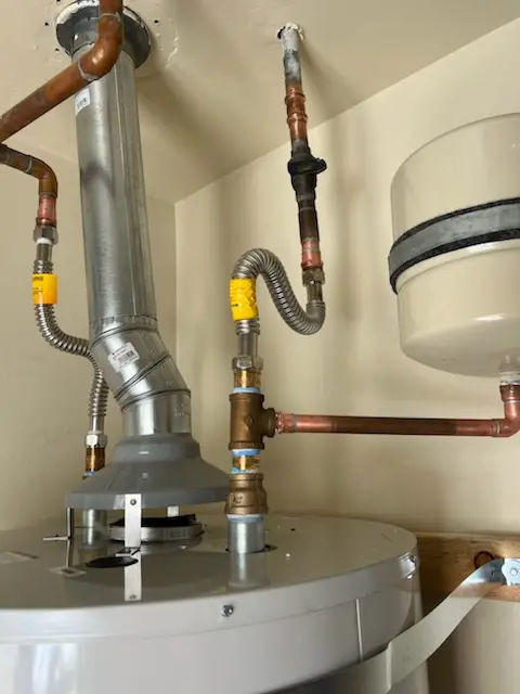 Water heater installation and plumbing repair in Combine
